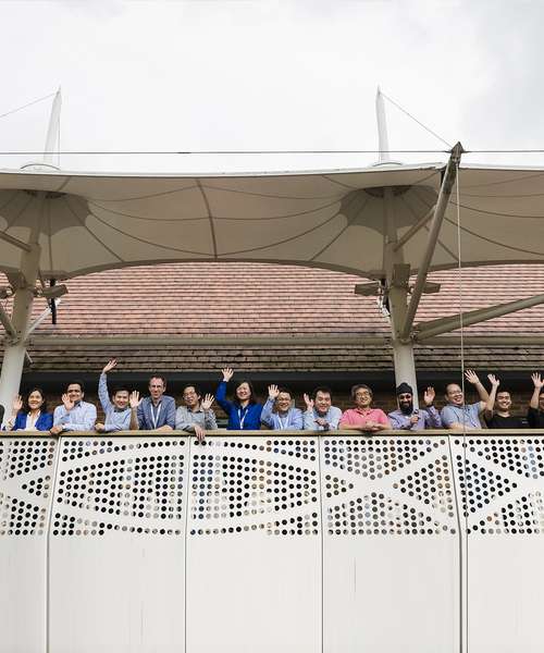 Ranplan team on balcony of the UK office